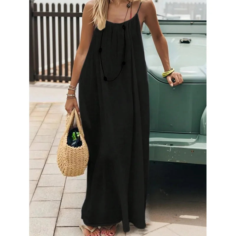Vestido largo y holgado de mujer sin tirantes y con la espalda al aire